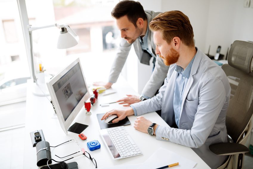 Coworkers planning startup goals